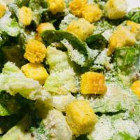 Classic Caesar Salad (Large) · Crisp romaine tossed with our house made dressing parmigiano and seasoned croutons.