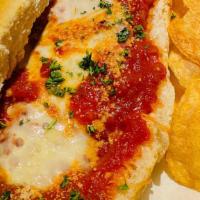 Eggplant Sandwich · Lightly breaded fried eggplant, topped with marinara sauce and melted mozzarella, served on ...
