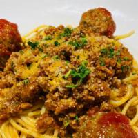 Spaghetti Bolognese · In our delicious meat sauce. Add meatballs or sausage for an additional charge. Your choice ...