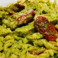 Gemelli Al Pesto · House made twisted pasta with grilled chicken and sun-dried tomatoes in our creamy pesto sau...