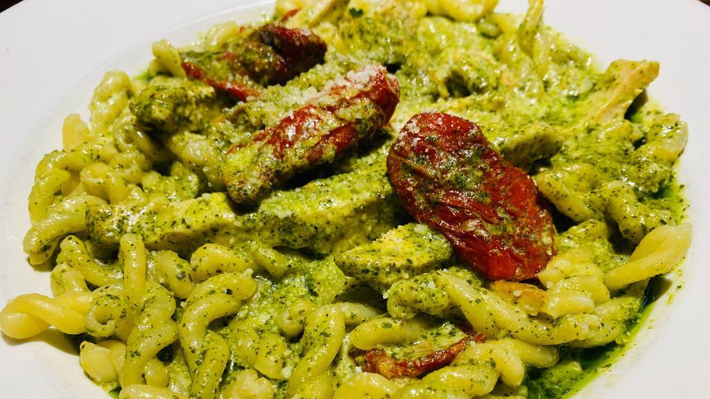Gemelli Al Pesto · House made twisted pasta with grilled chicken and sun-dried tomatoes in our creamy pesto sauce. Your choice of soup or salad and garlic bread.