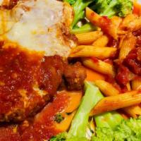 Chicken Parmigiana · Breast of chicken breaded and baked with marinara and mozzarella served with penne marinara ...