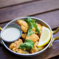 Chargrilled Cauliflower · Fresno chili & lime vinaigrette, cilantro, lemon