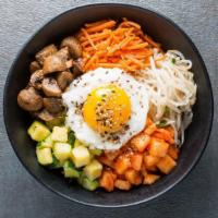 Bibimbap · Our traditional home-style rice bowl mixed with carefully prepared vegetables, expertly mari...