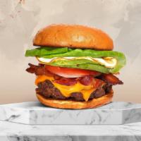 Bacon Through (Bacon & Egg Burger) · American beef patty topped with bacon, fried egg, avocado, melted cheese, buttered lettuce, ...