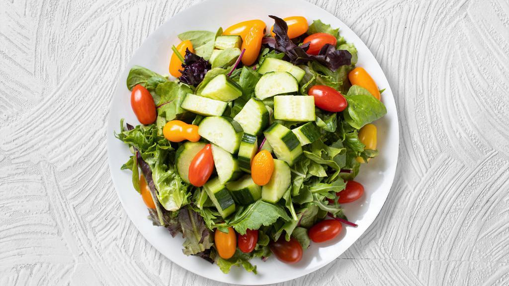 Great Garden Salad · Fresh lettuce, baby Greens, tomatoes, onions, cucumber, mushrooms, avocado, crispy tortilla chips & cheese.