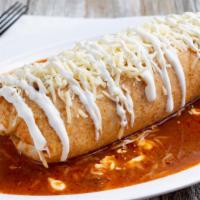 Pork Simmered Burro Chile Colorado Burrito · Delicious pork simmered in red chili sauce topped with red sauce, sour cream and guacamole, ...