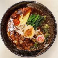 Tantan-Men Ramen · Slow roasted pork drippings with soy-based (shoyu) broth. Served with seasoned mince pork, a...
