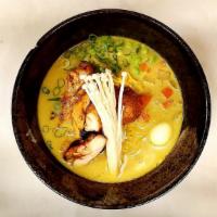 Saigon Curry Ramen · Lemongrass yellow coconut curry in chicken broth. Served with grilled chicken, fried taro ba...