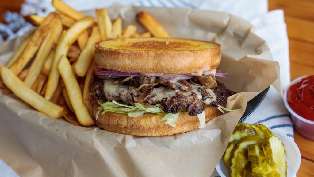 Sourdough Mushroom Burger · Grilled mushrooms, american-jack cheese, aur tangy house sauce, crunchy lettuce juicy tomato. and red onion on perfectly grilled sourdough bread!