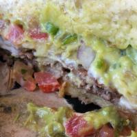 Spicy Queso Burger · Creamy, hot queso cheese fresh, house made salsa with avocado aioli, and crispy fried jalape...