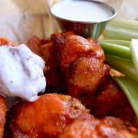 Chicken Wings · A whole pound of wings done the right way. Your choice of classic Buffalo, lemon pepper or h...