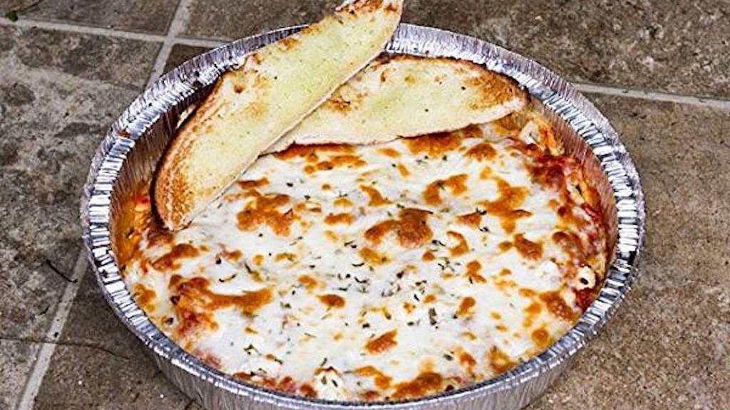 Quatro Formaggi Spaghetti · Spaghetti with marinara or meat sauce, mozzarella, Pecorino Romano, feta cheese, and Parmesan baked. Includes piece of garlic bread.