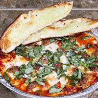 Cavatini · Lasagna noodles, beef, Italian sausage, pepperoni, ricotta, Parmesan, and tomato sauce toppe...