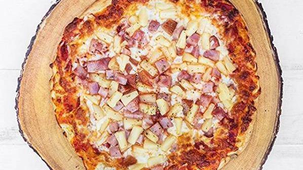 Hawaiian Pizza · Marinara, mozzarella, ham, and pineapple.