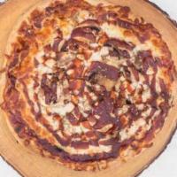 Bbq Chicken Pizza · Garlic, mozzarella, roasted chicken, mushrooms, BBQ sauce.