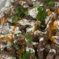 Beef Plate · Beef rice salad hummus taziki garlic sauce hot sauce.
