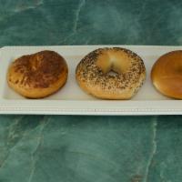 Bagel 🥯 · Boiled and baked round bread roll.