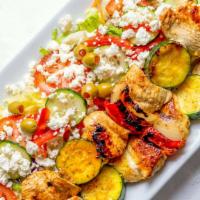 Vegetables Shish Kebab · Veal or chicken breast cubes, zucchini, peppers, and onions sprinkled with traditional herb ...