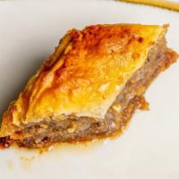 Baklava · Pastry made of layers of phyllo dough filled with chopped walnuts and sweetened with sugar s...