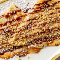 Crepes · Thin pancakes stuffed with jam or chocolate (Nutella) and walnuts.
