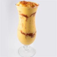 Mango Con Chile · We know you wish you were relaxing on a beach eating a chili mango, we do too. A creamy smoo...