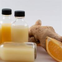 Turmeric Shot · Raw and cold pressed turmeric, orange, cayenne and black pepper. Energizing, immune system b...