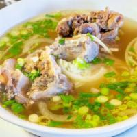 Pho Duoi Bo (Ox Tail) · Premium Ox Tail Beef Bones with Rice Noodle.