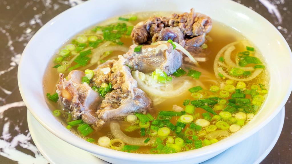 Pho Duoi Bo (Ox Tail) · Premium Ox Tail Beef Bones with Rice Noodle.