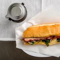 Dặc Biệt (Deluxe) · Traditional Vietnamese Sandwich with sliced BBQ Pork and Vietnamese Cold Cuts.