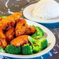 Orange Chicken · Spicy or Not Spicy with Jasmine Rice & Steamed Broccoli.
