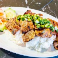 Cơm Tấm Heo (Pork) · Broken Rice with Grilled Pork, Lettuce, Tomatoes, Cucumbers, and side of Fish sauce. Broken ...