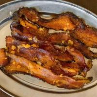 Crack Bacon · 5 pieces of maple bacon made with brown sugar and black pepper.