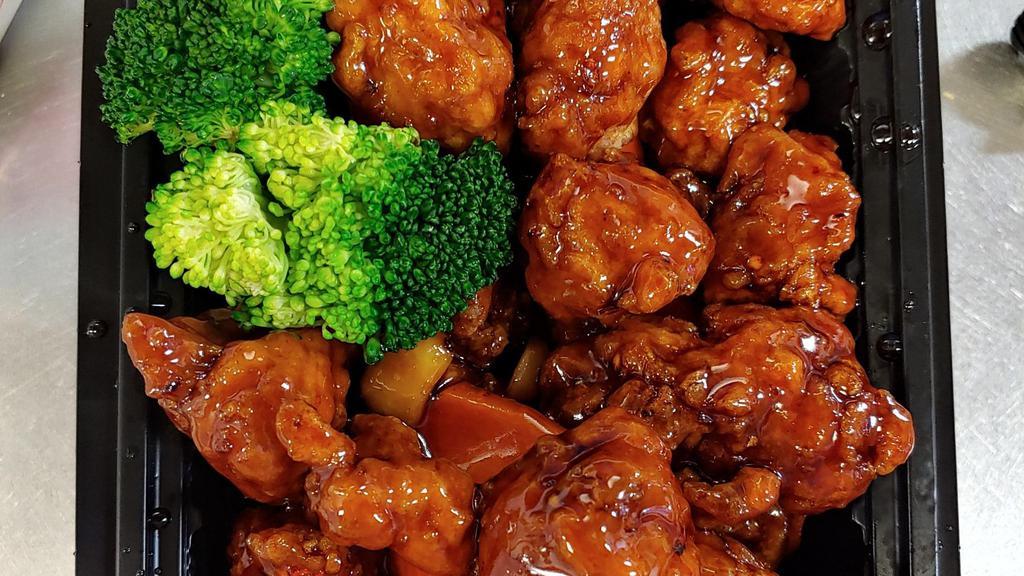 General Tso'S Chicken · Hot & spicy. Marinated chunk chicken, deep-fried & sautéed w. chef's special hot pepper garlic flavored tangy brown sauce.