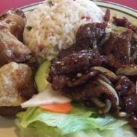 Spicy Beef · Sliced beef with a little lemon grass, onions, garlic with a touch of spice. Amazing sweet &...