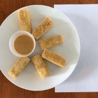 Golden Tofu · Tofu fried till golden served with spicy peanut sauce