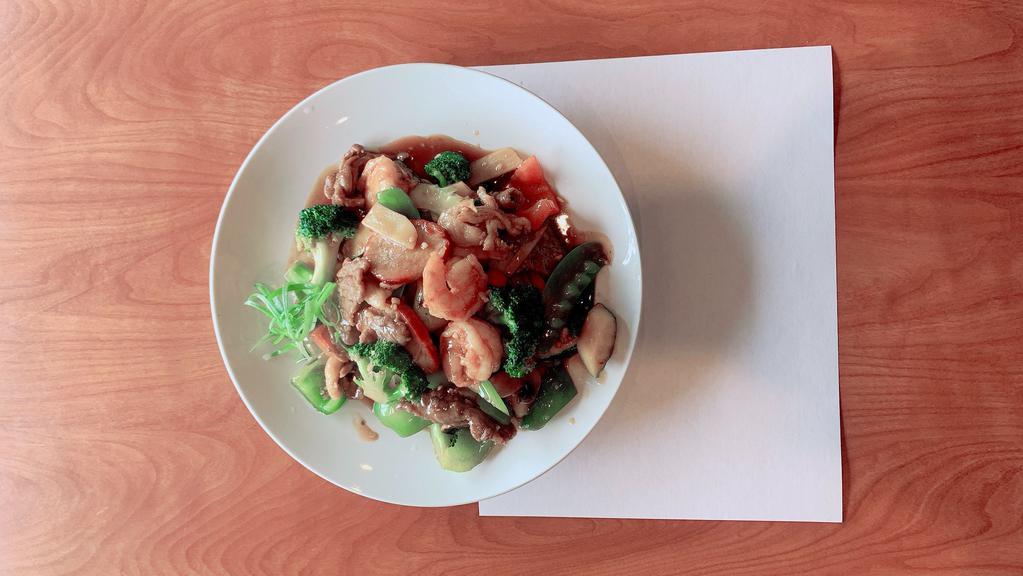 Happy Family · Shrimp, chicken, beef, roast pork stir-fried with mixed vegetables in brown sauce.