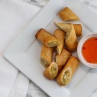 Spring Rolls · Deep fried rolls stuffed with glass noodle, cabbage and carrot served with plum sauce.