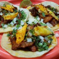 3 Pastor Tacos (Street Tacos) Side Rice & Beans · Delicious Tacos of Pastor (with fried onions and pineapple).
onion & cilantro, limes, red & ...