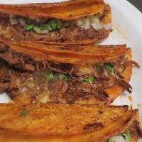 3 Quesabirrias (Birria Quesadillas)  · Combo with 3 quesabirrias and one free consome 8 oz.
Onion & cilantro, limes, red or green s...