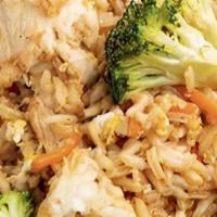 Combo Fried Rice (V) · Choose up to 3 proteins.  Fried rice with eggs, broccoli, carrots, and green onions.  Vegeta...