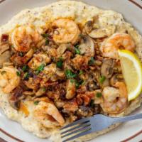Shrimp 'N Grits · Gluten-free. Pacific shrimp sauteed in garlic, green onions, mushrooms, and bacon served ove...