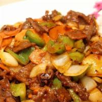 Kung Pao Beef · Stir-fried beef with onions, carrots, green peppers and peanuts.