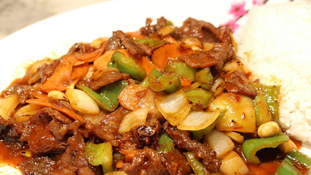 Kung Pao Beef · Stir-fried beef with onions, carrots, green peppers and peanuts.