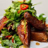 Vietnamese Sweet Potatoes · Agave glaze, nuoc cham, fresno peppers, fresh herbs