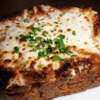 Focaccia · Fresh baked, cheese smothered