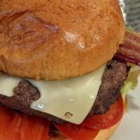 Fng Burger · 6oz grass-fed beef, cheddar, applewood smoked bacon, lettuce, tomato, pickle, on a brioche b...