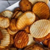Buffalo Chips · Ruffled potato slices. Try 'em spicy, plain or mixed. Served with your favorite dressing on ...