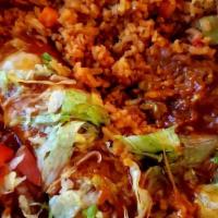 Spinach Enchilada Dinner · Two enchiladas stuffed with sauteed spinach, a delicate tomato sauce, zesty cheese dip, topp...
