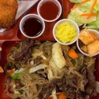 Bulgogi Bento · Marinade Korean style beef with onion, carrot, broccoli, zucchini, green onion and japche no...